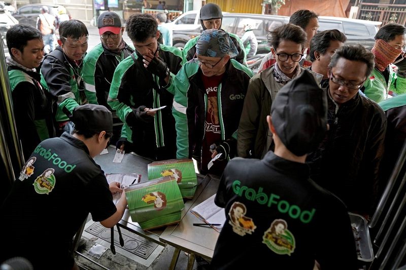 Grab đặt cược sinh mệnh vào dịch vụ giao đồ ăn - Ảnh 2. Grab đặt cược sinh mệnh vào dịch vụ giao đồ ăn - Ảnh 2.
