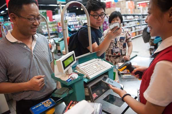 Thẻ tín dụng thất thế trong cuộc đua không dùng tiền mặt ở châu Á - Ảnh 1. Thẻ tín dụng thất thế trong cuộc đua không dùng tiền mặt ở châu Á - Ảnh 1.