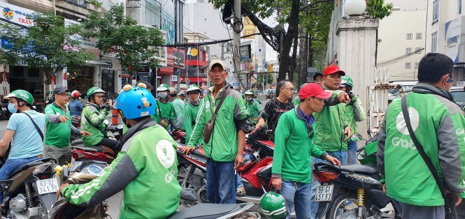 Thu thuế với tài xế xe công nghệ, bao nhiêu là vừa? - Ảnh 1. Thu thuế với tài xế xe công nghệ, bao nhiêu là vừa? - Ảnh 1.