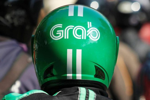 Malaysia điều tra 'hành vi độc quyền' của Grab - Ảnh 1. Malaysia điều tra 'hành vi độc quyền' của Grab - Ảnh 1.