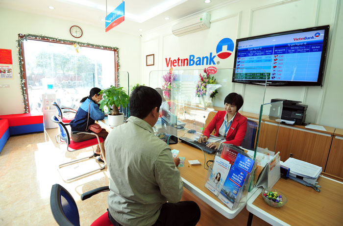 Ngân hàng đua báo lãi khủng, có nhà băng cán mốc tỉ USD - Ảnh 3. Ngân hàng đua báo lãi khủng, có nhà băng cán mốc tỉ USD - Ảnh 3.