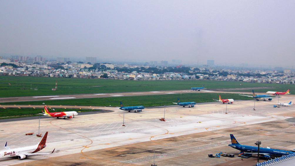 Cứ 1,4 phút có 1 chuyến bay cất, hạ cánh ở Tân Sơn Nhất dịp Tết - Ảnh 2. Cứ 1,4 phút có 1 chuyến bay cất, hạ cánh ở Tân Sơn Nhất dịp Tết - Ảnh 2.