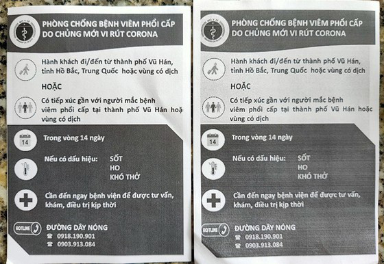 Nhân viên sân bay Tân Sơn Nhất không rời mắt khỏi máy đo thân nhiệt - Ảnh 2.
