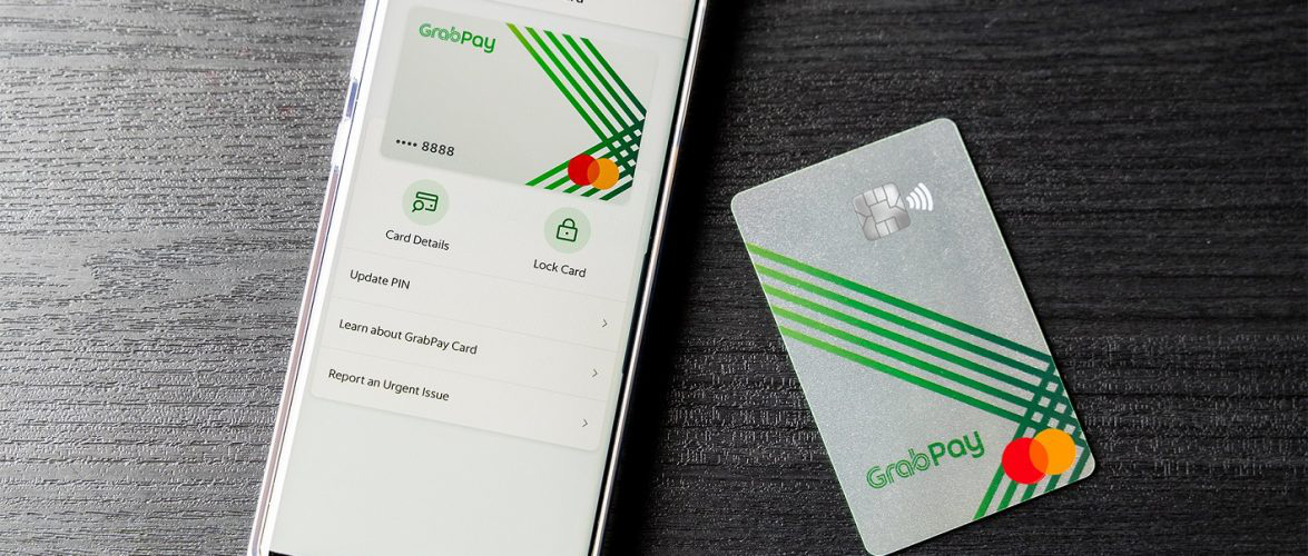 Grab hủy chương trình ứng tiền mặt với tài xế và đối tác giao đồ ăn - Ảnh 2.