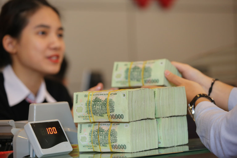 Ngân hàng, bất động sản lãi hơn 6 tỉ USD, chiếm một nửa lợi nhuận các doanh nghiệp niêm yết - Ảnh 1. Ngân hàng, bất động sản lãi hơn 6 tỉ USD, chiếm một nửa lợi nhuận các doanh nghiệp niêm yết - Ảnh 1.