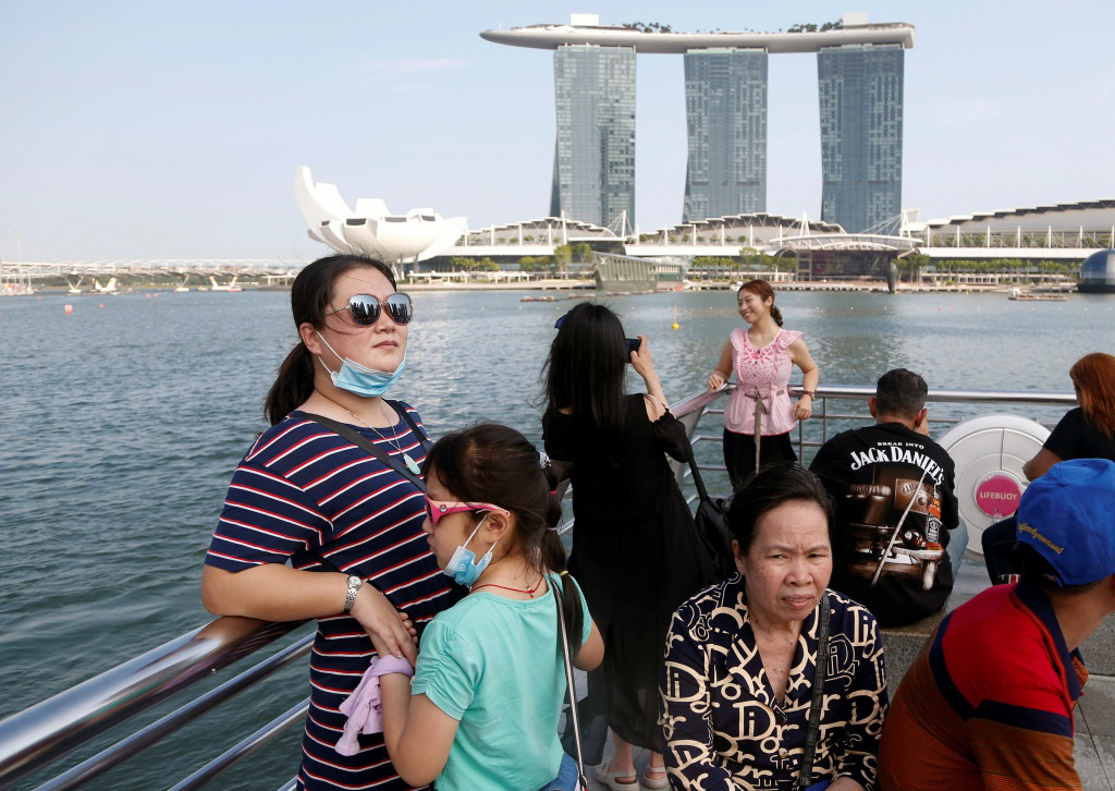 Cách tiếp cận không thương tiếc của Singapore khi chống Covid-19 - Ảnh 2. Cách tiếp cận không thương tiếc của Singapore khi chống Covid-19 - Ảnh 2.