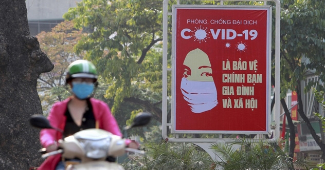 Việt Nam đã làm phẳng đường cong Covid-19 như thế nào? - Ảnh 1. Việt Nam đã làm phẳng đường cong Covid-19 như thế nào? - Ảnh 1.