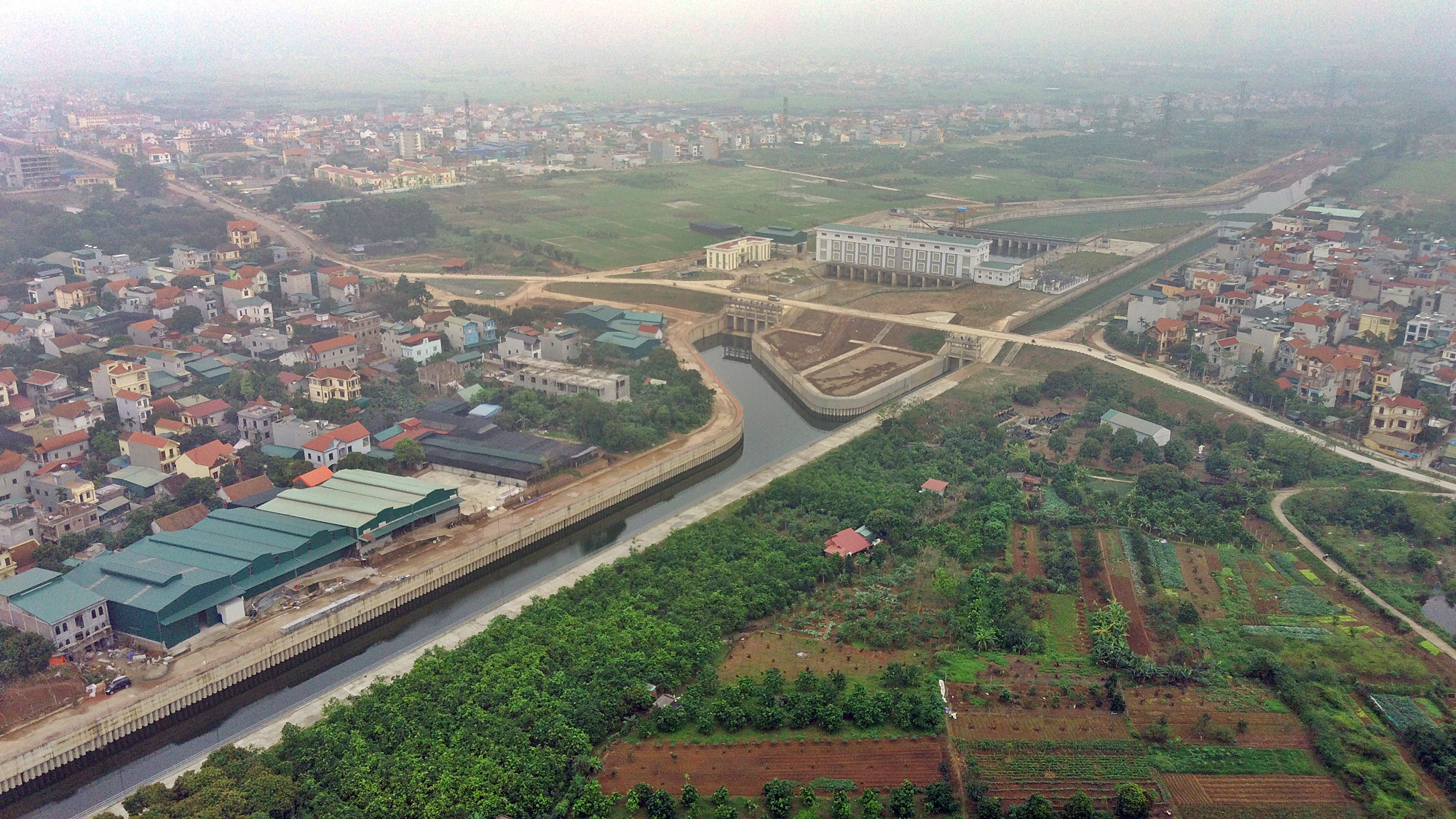 Hà Nội bước vào mùa mưa, dự án trạm bơm tiêu Yên Nghĩa chống ngập phía Tây Thủ đô bây giờ ra sao? - Ảnh 1. Hà Nội bước vào mùa mưa, dự án trạm bơm tiêu Yên Nghĩa chống ngập phía Tây Thủ đô bây giờ ra sao? - Ảnh 1.