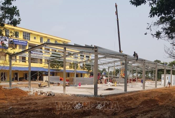 Bộ Xây dựng lên phương án thi công bệnh viện dã chiến - Ảnh 1.