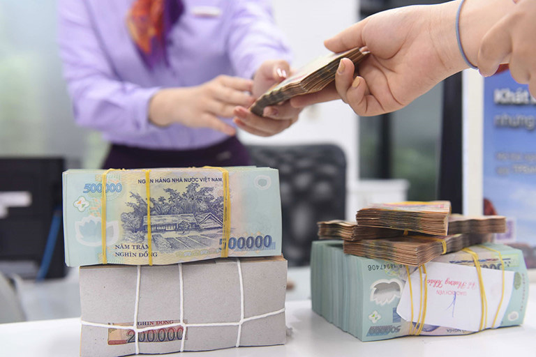 Fitch điều chỉnh triển vọng của Việt Nam từ tích cực sang ổn định, Bộ Tài chính nói gì? - Ảnh 1.