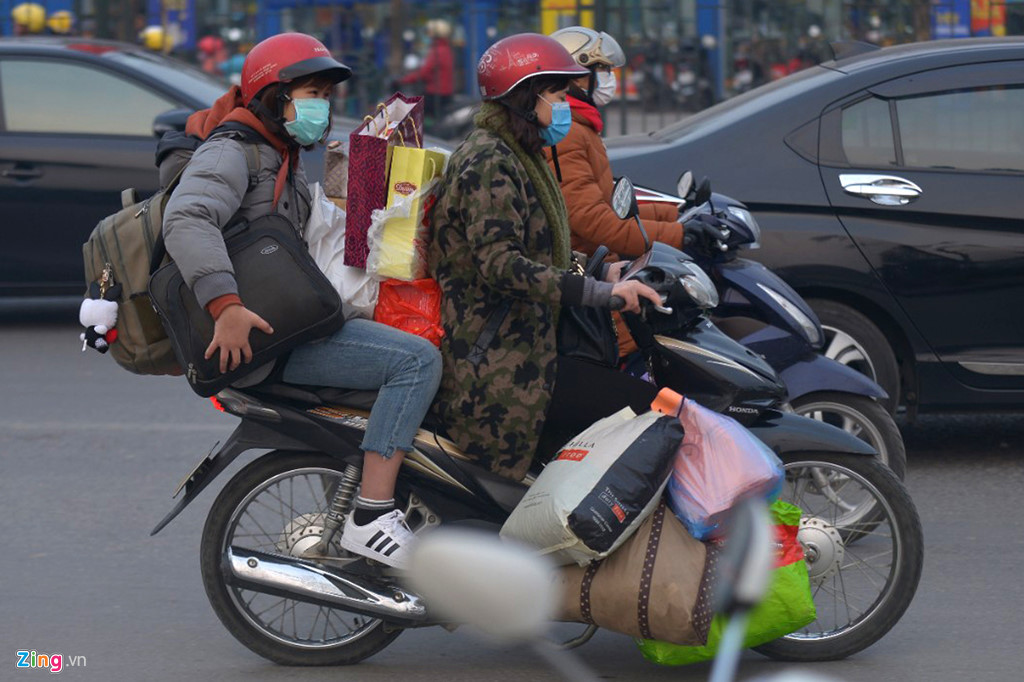 linh kinh tivi canh dao ve que an tet sau ngay lam viec cuoi cung
