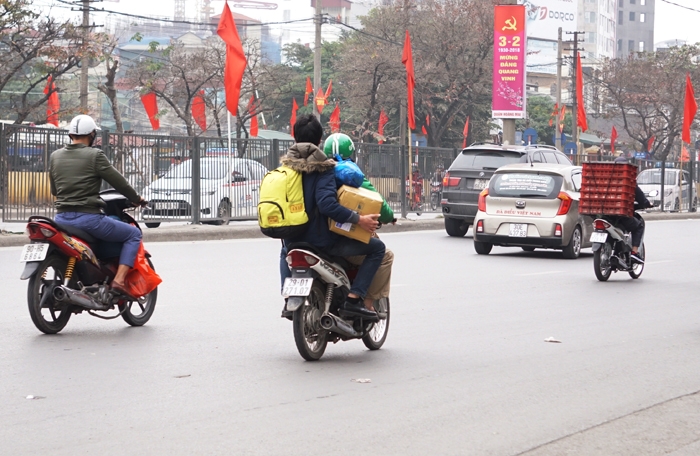 tai xe khoac ao grabbike vo tu pham luat ngay mung 5 tet