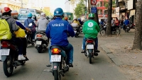 grab mua uber o dong nam a them nhieu chu lo
