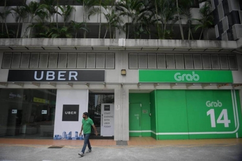 he lo buoi lam viec giua grab va cuc canh tranh sau khi mua uber