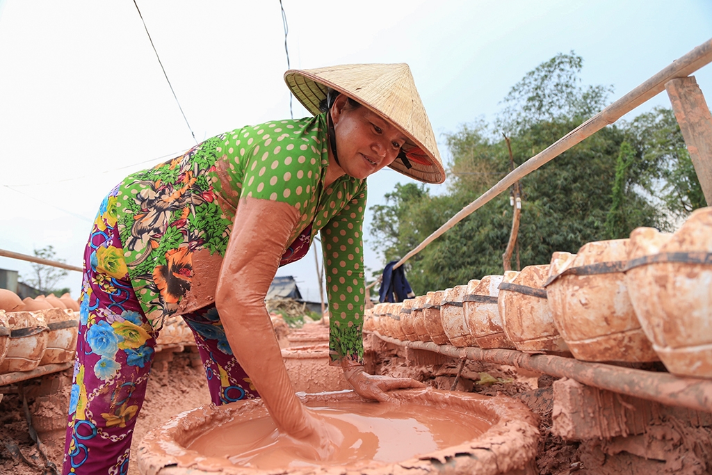 lang gom binh duong hoi ha san xuat ga vang don tet dinh dau