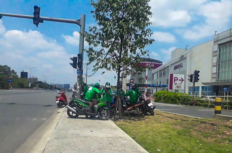 grab cong khai hoat dong tai binh duong du khong duoc cap phep