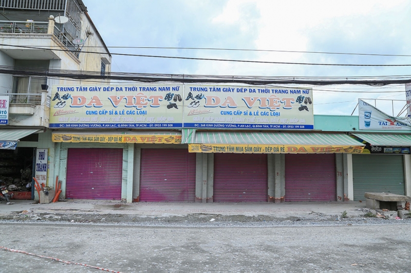nhieu cua hang doanh nghiep dong cua vi bao bui tren duong kinh duong vuong
