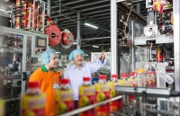 coca cola chinh thuc ban do uong co con