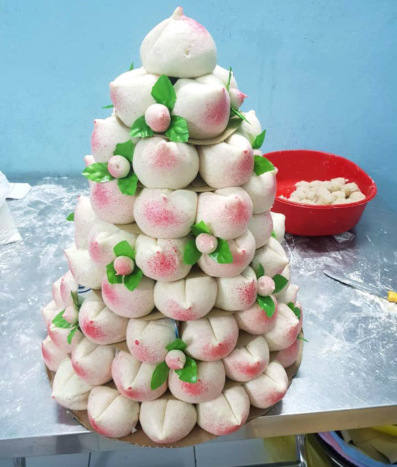 phat sot voi co ram thang gieng 100 cai banh bao dao tien hong ruc