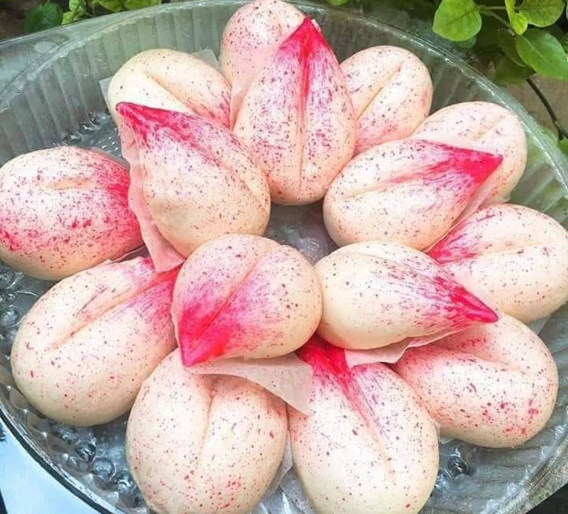 phat sot voi co ram thang gieng 100 cai banh bao dao tien hong ruc