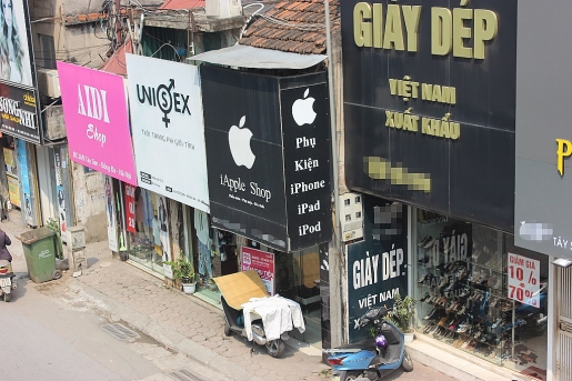 ha noi hang loat cua hang ban iphone dong loat go logo qua tao can do
