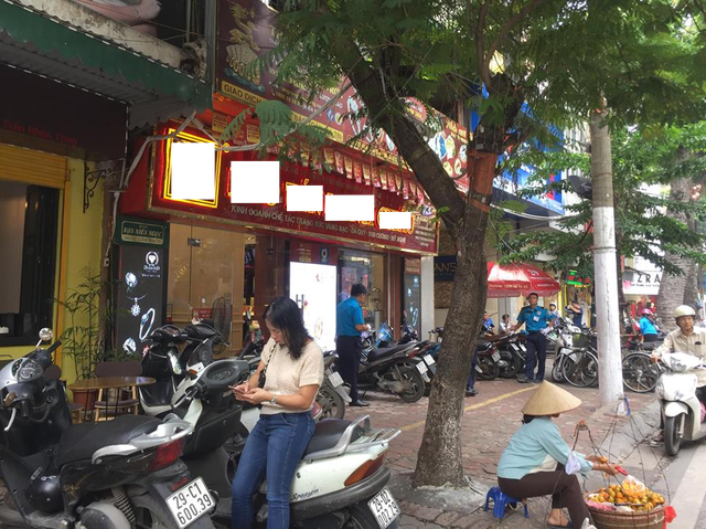 Hà Nội: Sợ bị phạt, nhiều người bỏ ngủ trưa tìm chỗ đổi USD ha noi so bi phat nhieu nguoi bo ngu trua tim cho doi usd