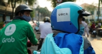thanh lap hoi dong xu li hanh vi tap trung kinh te cua grab uber