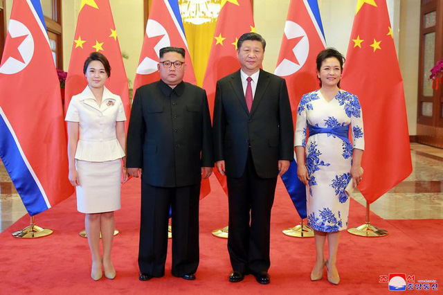 trieu tien bat ngo cong bo hinh anh ong kim jong un tham trung quoc
