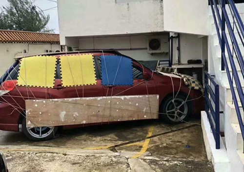 nguoi macau chang buoc oto chong sieu bao mangkhut