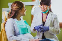 Vì sao trước khi mang thai phụ nữ cần đến gặp nha sĩ?
