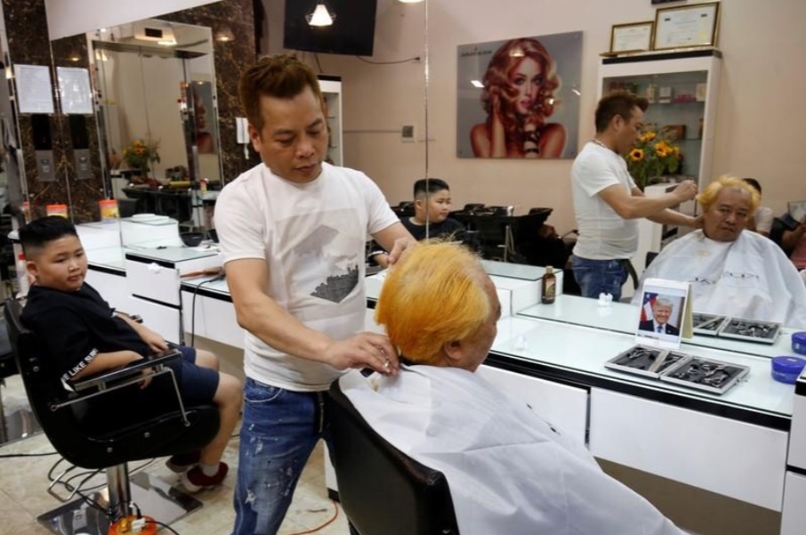salon ha noi mien phi cat toc kieu kim jong un trump len bao nuoc ngoai