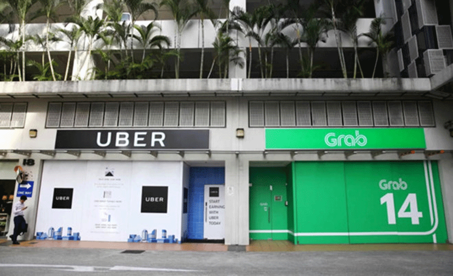 grab mua lai uber day song khi co quyet dinh dieu tra bo sung