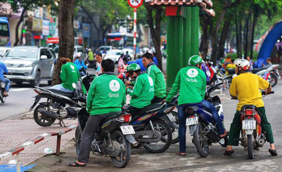 grab theo chan uber thay doi cach tinh gia cuoc cong tien thoi gian di chuyen