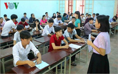 Giảng viên nào được miễn thi Ngoại ngữ và Tin học khi thăng hạng?