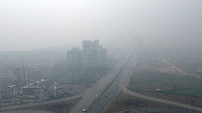 suong mu bao trum ha noi trong ngay lam viec dau nam 2018