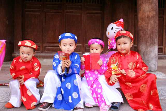 mo tiet kiem dong bao hiem cho con tu tien li xi
