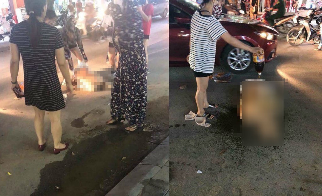 thanh hoa nhom phu nu lot do do nuoc mam ot bot len nguoi co gai giua duong