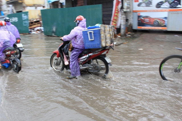 tran mua lon giup chao lua ha noi ha nhiet