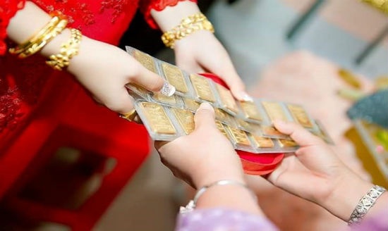 vang va tien cuoi la tai san chung hay rieng