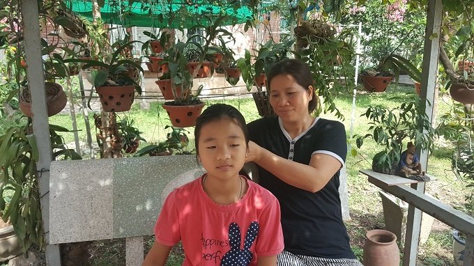 nguoi me don than nuoi 7 con trong can nha dac biet giua long ha noi