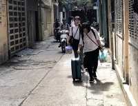 ha noi phat hien xac chet phan huy boc mui trong nha tam