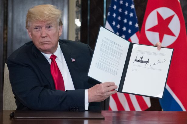 giai ma chu ky cua trump trong thoa thuan lich su voi kim jong un