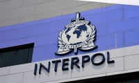 nhung bi an dang sau bieu tuong cua to chuc interpol