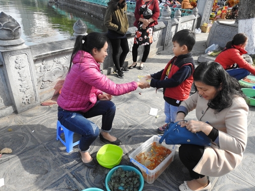 mung 1 tet nguoi ha noi no nuc di xin chu le chua