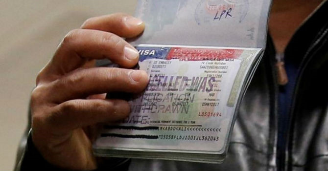 nha giau trung quoc dan mat hung thu voi visa vang cua my